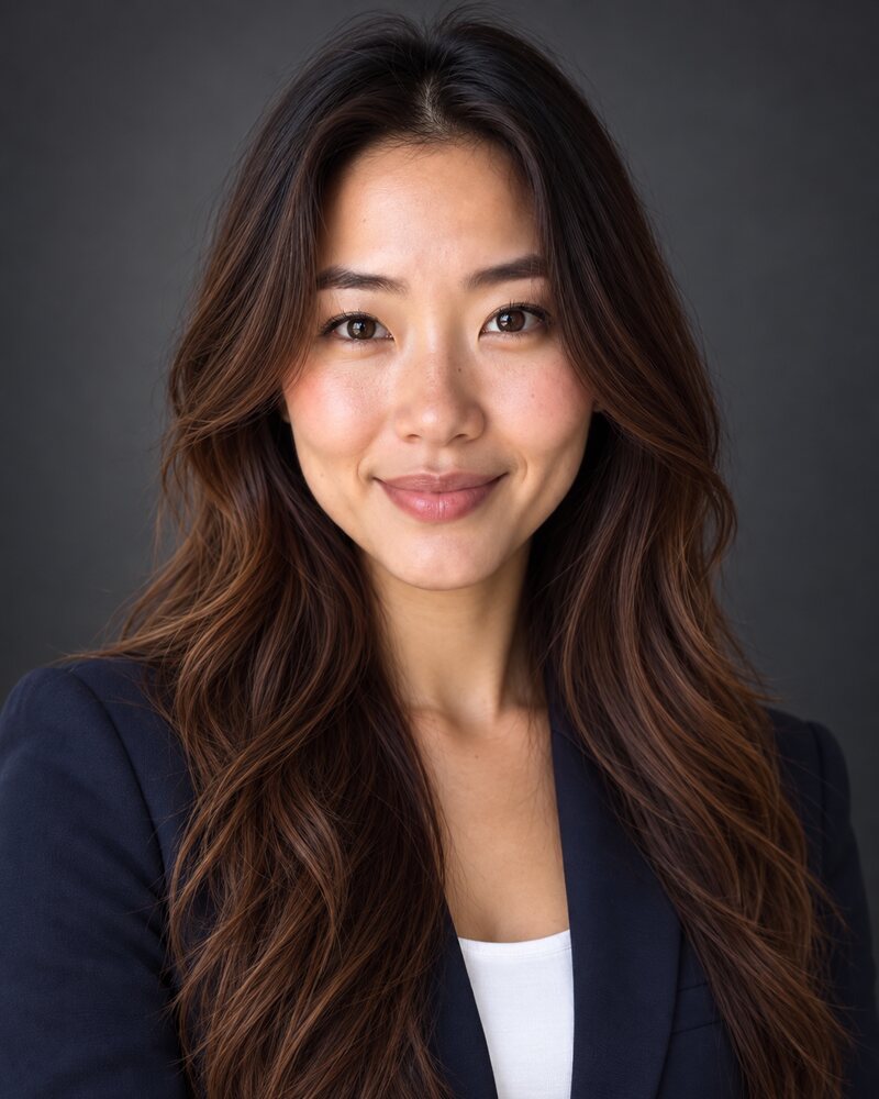 Headshot on a charcoal background