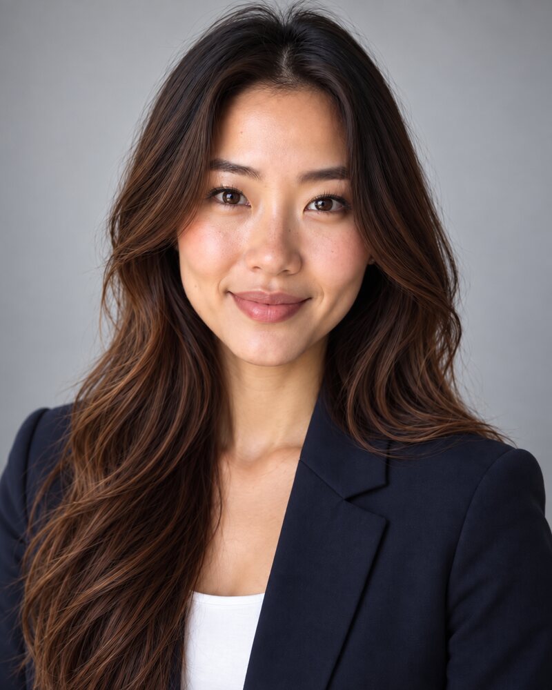 Headshot on a light grey background
